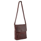 Brown leather crossbody bag on a white background